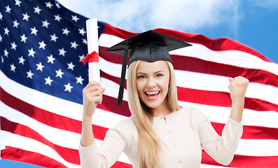 Image showing happy student girl with diploma over american flag