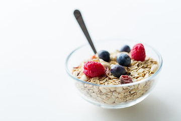 Image showing close up of bowl with granola or muesli on table