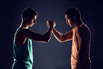 Image showing young men wrestling