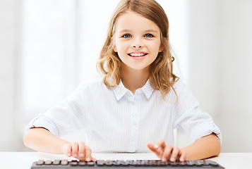 Image showing student girl with keyboard