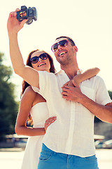 Image showing smiling couple in city