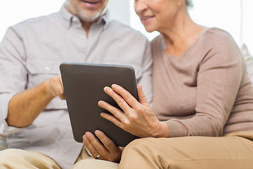 Image showing close up of happy senior couple with tablet pc