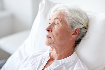 Image showing senior woman patient lying in bed at hospital ward