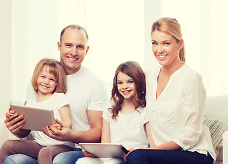 Image showing family and two kids with tablet pc computers