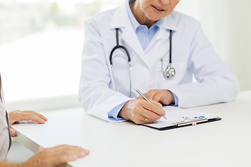 Image showing close up of senior doctor and patient at hospital