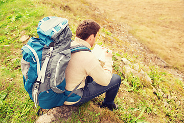 Image showing man with backpack hiking