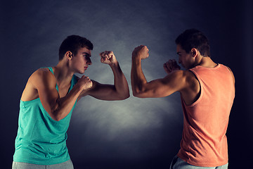 Image showing young men wrestling