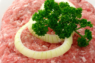 Image showing Meatloaf with onion rings and herbs