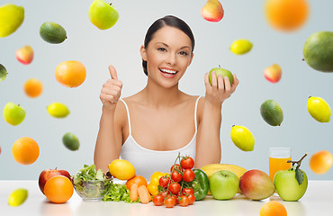 Image showing happy woman with healthy food showing thumbs up