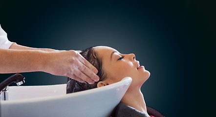 Image showing happy young woman at hair salon