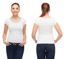 Image showing smiling young woman in blank white t-shirt