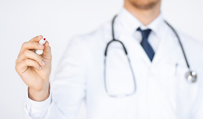 Image showing doctor writing something in the air