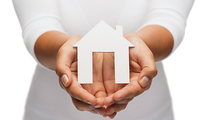 Image showing woman hands with paper house