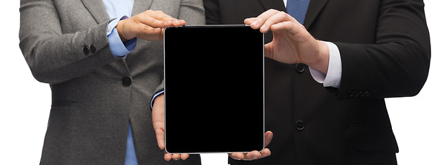 Image showing businessman and businesswoman with tablet pc