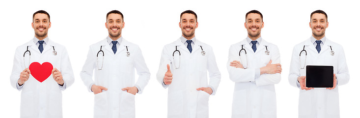 Image showing doctors with red heart, tablet pc and clipboard