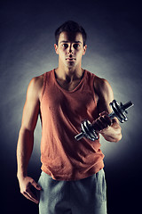 Image showing young man with dumbbell