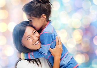 Image showing happy mother and daughter hugging