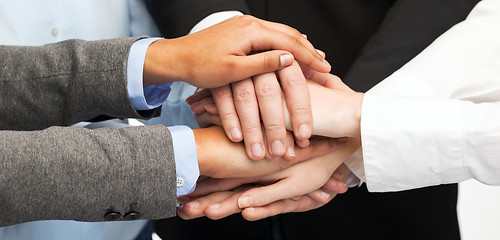 Image showing group of businesspeople celebrating victory