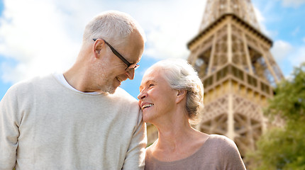 Image showing happy senior couple over paris eiffel tower