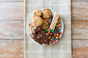 Image showing close up of candies, chocolate, muesli and cookies