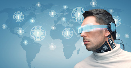 Image showing man with futuristic glasses and sensors