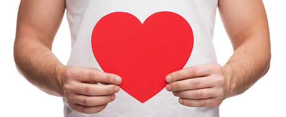 Image showing closeup of man hands with heart