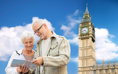 Image showing senior couple with map over london big ben tower