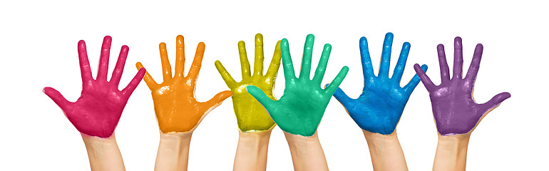 Image showing palms of human hands painted in rainbow colors