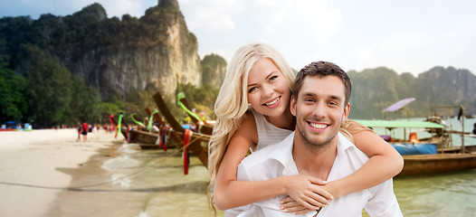 Image showing happy couple having fun on summer beach