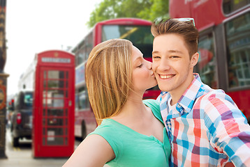 Image showing happy couple taking selfie over london city