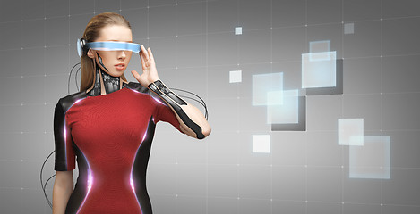 Image showing woman with futuristic glasses and sensors