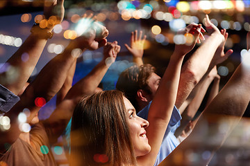 Image showing smiling friends at concert in club