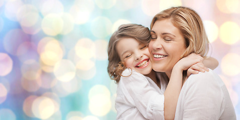 Image showing happy mother and daughter hugging