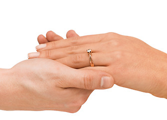 Image showing man puts wedding ring on woman hand