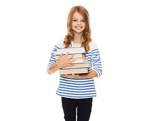 Image showing little student girl with many books