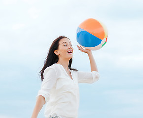 Image showing girl with ball on the beach