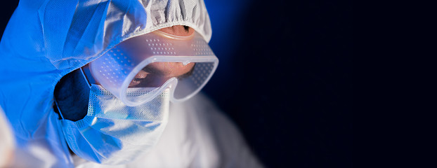 Image showing close up of scientist face in chemical lab