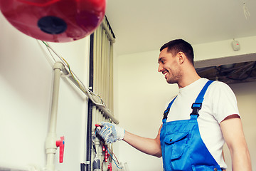 Image showing builder or plumber working indoors