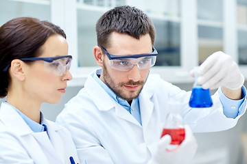 Image showing young scientists making test or research in lab