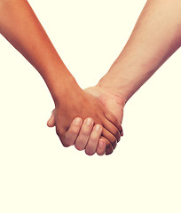 Image showing woman and man holding hands