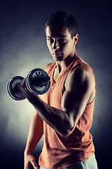 Image showing young man with dumbbell