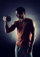 Image showing young man with dumbbell