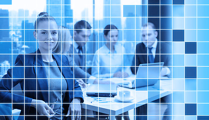 Image showing businesswoman and business team at office 