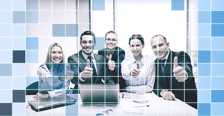 Image showing business team showing thumbs up in office