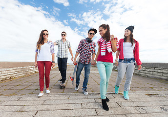 Image showing teenagers with skates outside