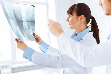 Image showing doctor and nurse exploring x-ray