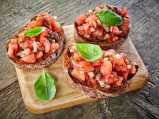 Image showing toasted bread with tomato and basil