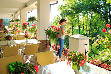 Image showing Woman in outdoor restaurant