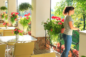 Image showing Woman in outdoor restaurant