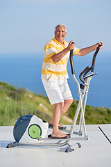 Image showing healthy senior man working out